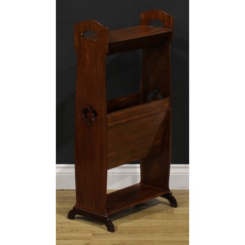 364 - An Edwardian Art Nouveau mahogany periodical stand, the sides pierced with organic motifs, sledge ba... 