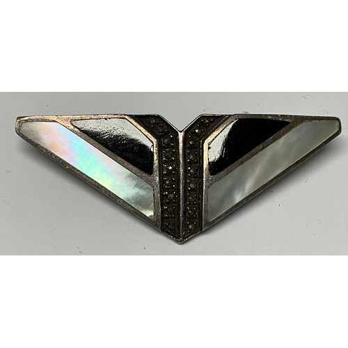 422 - An Art Deco continental silver and marcasite triangular brooch, inlaid with mother-of-pearl and blac... 