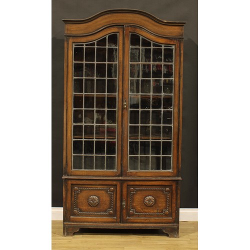 374 - A Jacobean Revival oak bookcase, 194cm high, 103cm wide, 38cm deep, c.1935