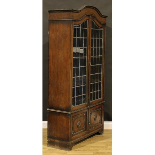 374 - A Jacobean Revival oak bookcase, 194cm high, 103cm wide, 38cm deep, c.1935