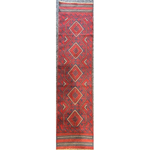 456 - Oriental Carpets - a hand knotted woollen Meshwani runner, 254cm x 57cm