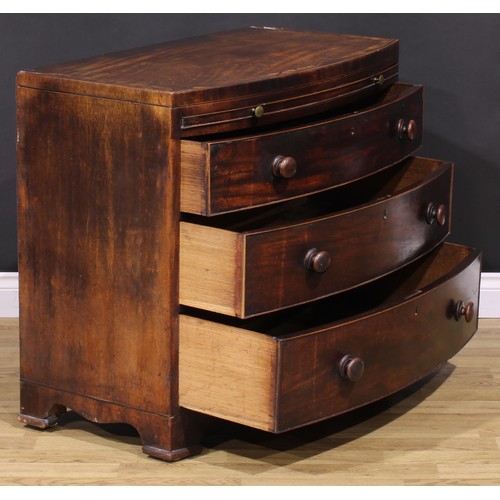 377 - A George III mahogany bowfront bachelor’s chest, caddy top above a slide and three long graduated co... 