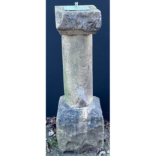 443 - A stone and reconstituted stone garden sundial, 100.5cm high, the top 26cm square