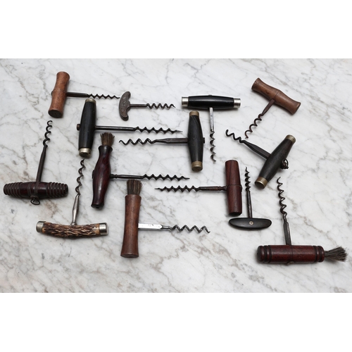 496 - Helixophilia - a 19th century steel T-type direct pull corkscrew, turned rosewood handle with brush,... 