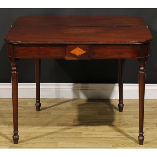 377A - A George III mahogany tea table, hinged top above a deep frieze inlaid with a satinwood lozenge and ... 