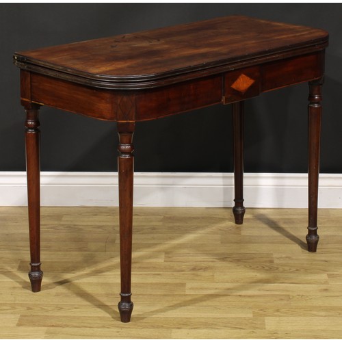 377A - A George III mahogany tea table, hinged top above a deep frieze inlaid with a satinwood lozenge and ... 