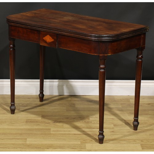 377A - A George III mahogany tea table, hinged top above a deep frieze inlaid with a satinwood lozenge and ... 