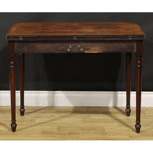 377A - A George III mahogany tea table, hinged top above a deep frieze inlaid with a satinwood lozenge and ... 