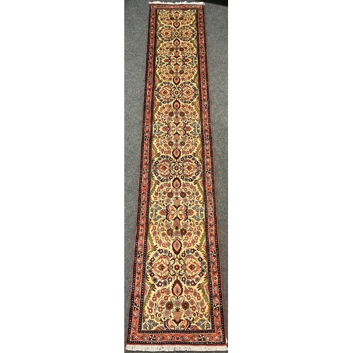 68 - A North West Persian Rudbar runner carpet, hand-knotted, 404cm x 74cm.