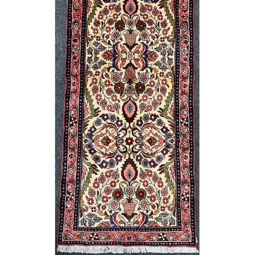 68 - A North West Persian Rudbar runner carpet, hand-knotted, 404cm x 74cm.