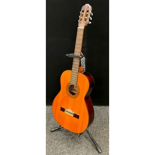 79 - A Japanese Kimbara 169 FCN -London six string acoustic Guitar with stand