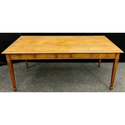 87 - A figured maple veneer dining table, 76.5cm high x 182.5cm x 91.5cm.