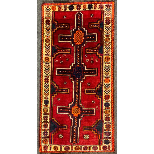 99 - A South West Persian Lori Rug / carpet, hand-knotted in rich tones of red, deep blue, orange, cream,... 