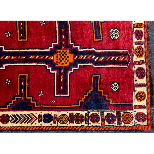 99 - A South West Persian Lori Rug / carpet, hand-knotted in rich tones of red, deep blue, orange, cream,... 