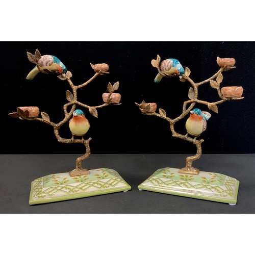 138 - A pair of gilt metal tree stands with hand painted porcelain birds perched on the  tree, faux mark, ... 