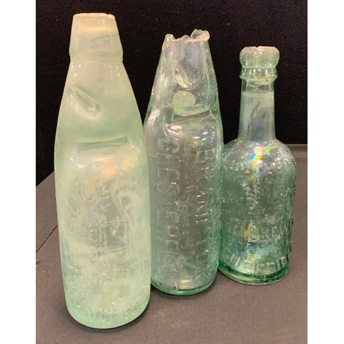 139 - A collection of 19th century and later glass bottles; T.Lighton Brampton Chesterfield cod bottle, J.... 