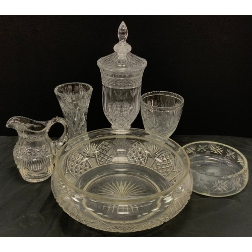 147 - A large cut glass punch bowl, waisted body with arched hobnail cut panels, rolled lip, solid foot,  ... 