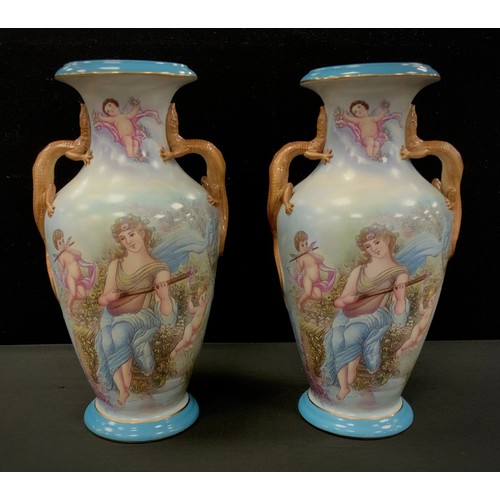 196 - A pair of blue baluster porcelain vases, twin lizard handles, decorated with printed ladies and cher... 