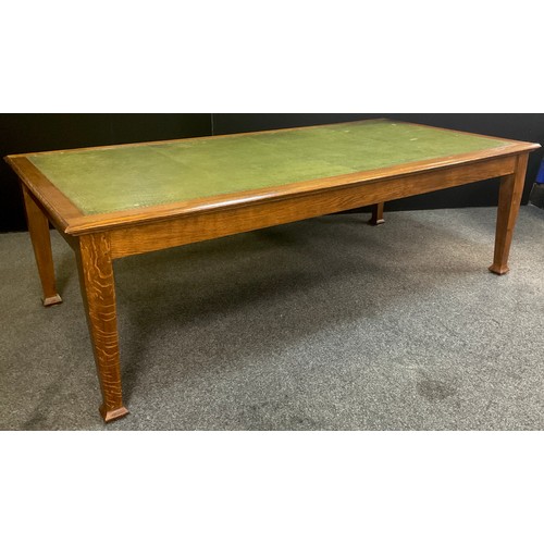 210 - An Arts and Crafts style oak boardroom table, tooled green leather inset top, tapered square legs, 7... 