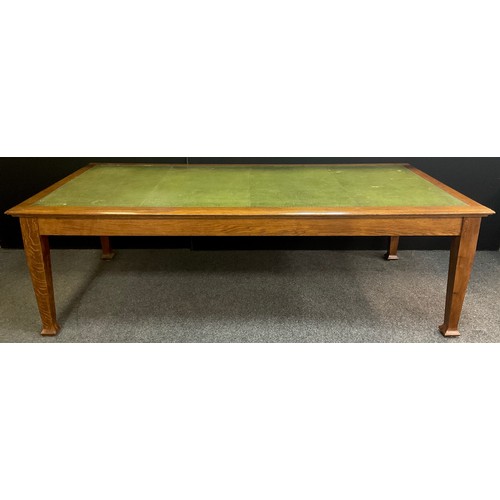 210 - An Arts and Crafts style oak boardroom table, tooled green leather inset top, tapered square legs, 7... 