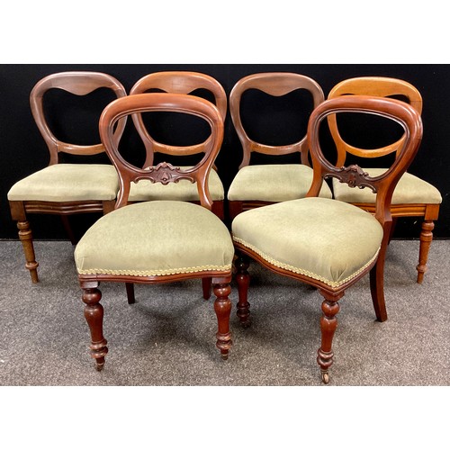 211 - A set of four Victorian mahogany balloon-back dining chairs, and a similar pair of chairs, making a ... 