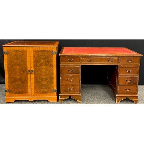 251 - A walnut veneered pedestal desk, 76cm high x 121cm wide x 61cm deep;  a burr walnut veneered side ca... 