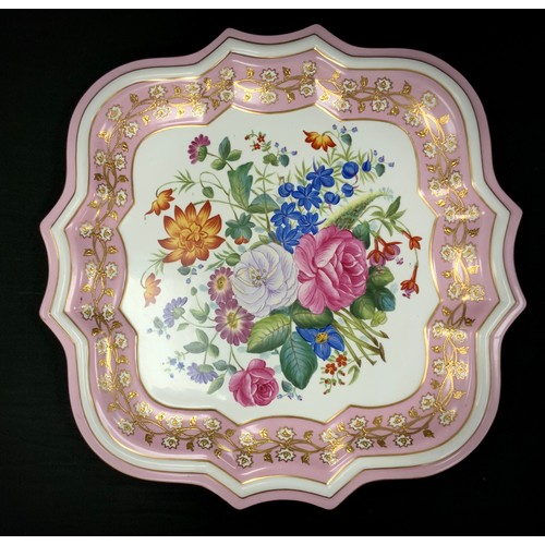 253 - A large quatrefoil pink porcelain tray, decorated  with flowers and gilded border, faux Sevres mark,... 