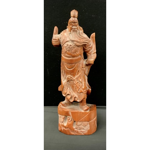 254 - A exotic hardwood figure of Chinese Samurai Warrior, 60cm high