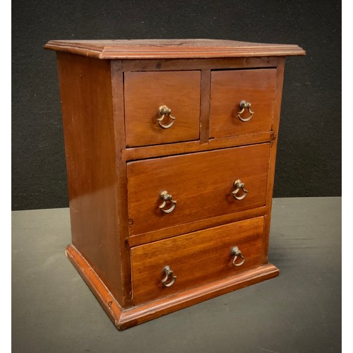 258 - Miniature Furniture - an early 20th century chest of two short and two long drawers