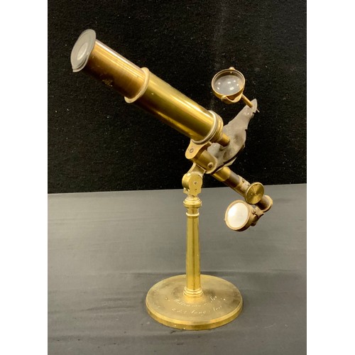 290 - A 19th century brass monocular travelling microscope, slide action focus, screw off circular foot, s... 