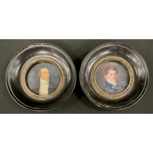 292 - A pair of reproduction portrait miniatures, circular ebonised wooden frames, 15cm dia overall (2)