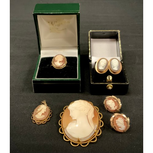 333 - A pair of carved cameo 9ct gold mounted oval earrings, portraits of lady's with long hair, another s... 