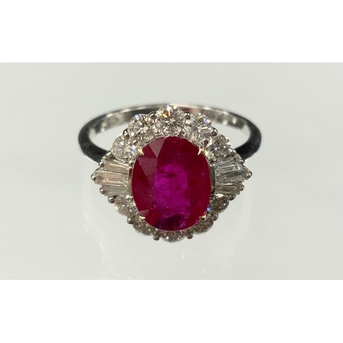 360 - A certified ruby and diamond ring, central oval mixed cut ruby, 2.05ct, surrounded by sixteen round ... 