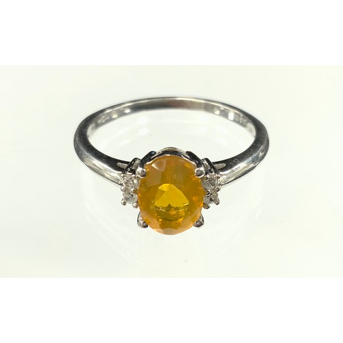 365 - A fire opal and white sapphire ring, oval cut fire opal aprox 1.0ct, between pair of white sapphires... 