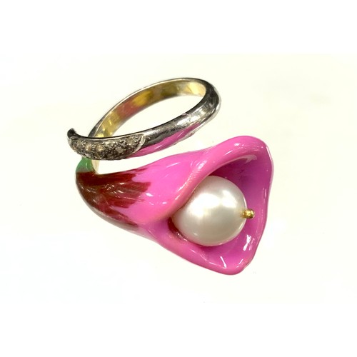 366 - An unusual diamond and cultured pearl enamel flowerhead ring, tapering pink and red flowerhead crest... 