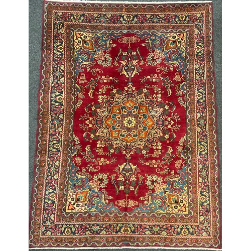 70A - A North West Persian Tabriz carpet, hand-knotted with elaborate Central medallion, within a field of... 