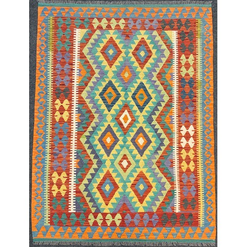 200A - A Turkish Anatolian Kilim rug, knotted with a traditional design, in bright colours, red, orange, tu... 