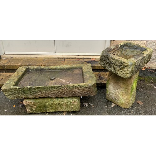 151A - A shallow Derbyshire Gritstone trough, 14cm high x 89cm x 52cm, associated base;  another, 15cm high... 