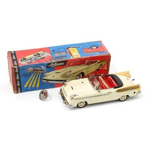 7221 - A Schuco (Germany) 5700 ‘Synchromatic’ tinplate and battery operated Packard convertible, cream body... 