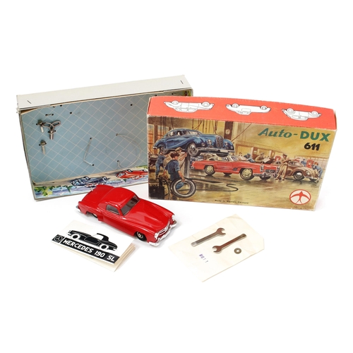 7224 - An Auto-Dux (West German) 611 plastic and clockwork Mercedes 190 SL construction kit, red body, boxe... 