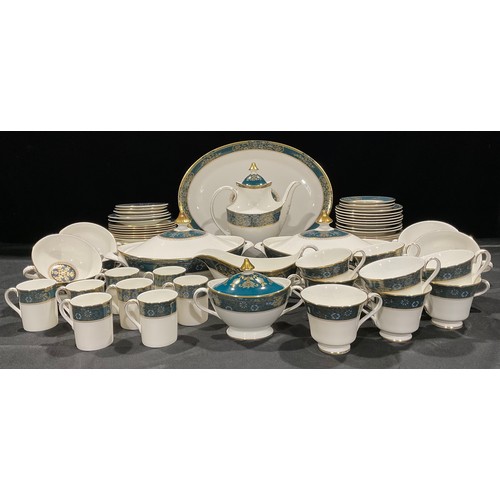 29 - A Royal Doulton Carlyle pattern dinner and tea service, pattern number H 5018, comprising pair of ov... 