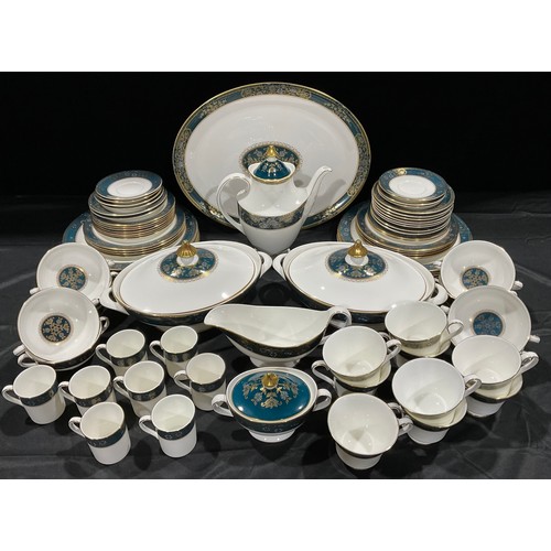 29 - A Royal Doulton Carlyle pattern dinner and tea service, pattern number H 5018, comprising pair of ov... 