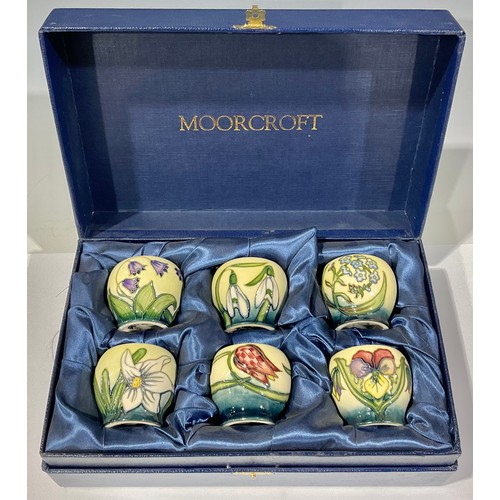 37 - A set of six Moorcroft miniature vases, tube lined, various patterns, lined presentation box.