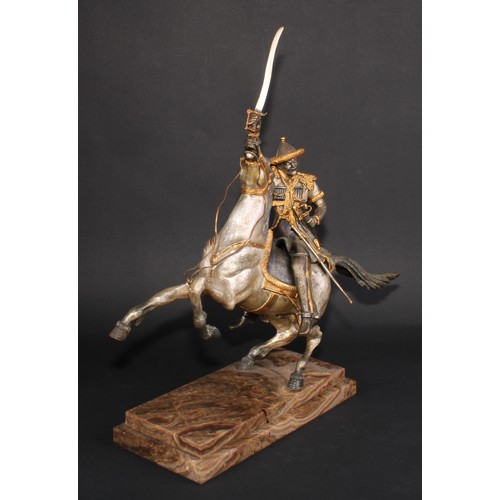 3363 - Continental School (20th century), a parcel-gilt and silvered bronze, of a cavalry officer on horseb... 