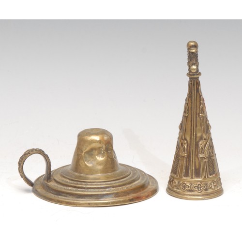 3221 - An early Victorian Gothic Revival brass candle snuffer and stand, embossed with tracery and architec... 