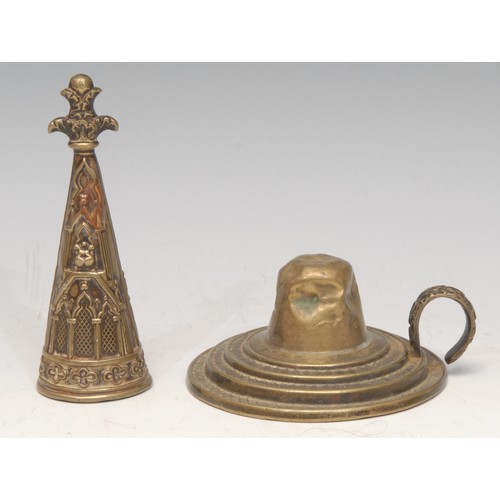 3221 - An early Victorian Gothic Revival brass candle snuffer and stand, embossed with tracery and architec... 