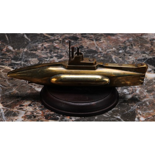 3220 - An early to mid 20th century brass desk weight, as a submarine, 15cm wide