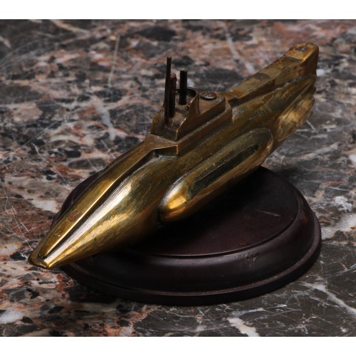 3220 - An early to mid 20th century brass desk weight, as a submarine, 15cm wide