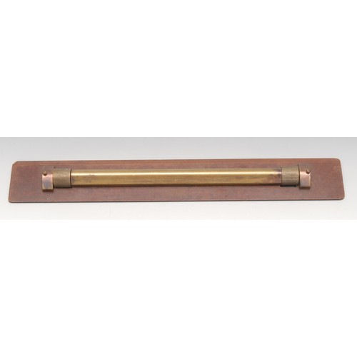 3379 - A World War II period brass and bakelite rolling rule, marked B7622 Astonmanda, 38cm long, dated 194... 