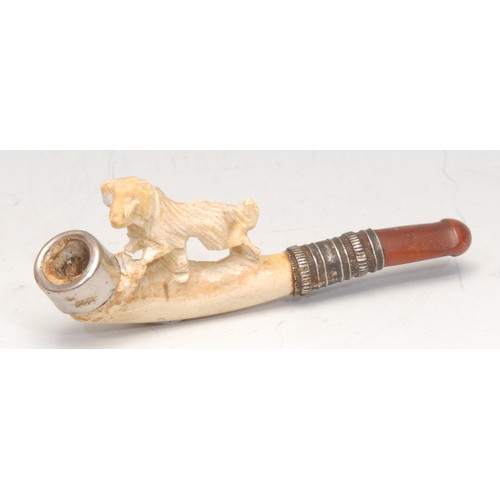 3107 - A German meerschaum novelty cheroot holder, carved with a retriever dog, 7.5cm long, early 20th cent... 